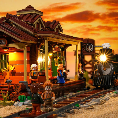 Funwhole Western Bahnhof Klemmbaustein-Set in Wüstenkulisse mit Dampflokomotive und Minifiguren.
