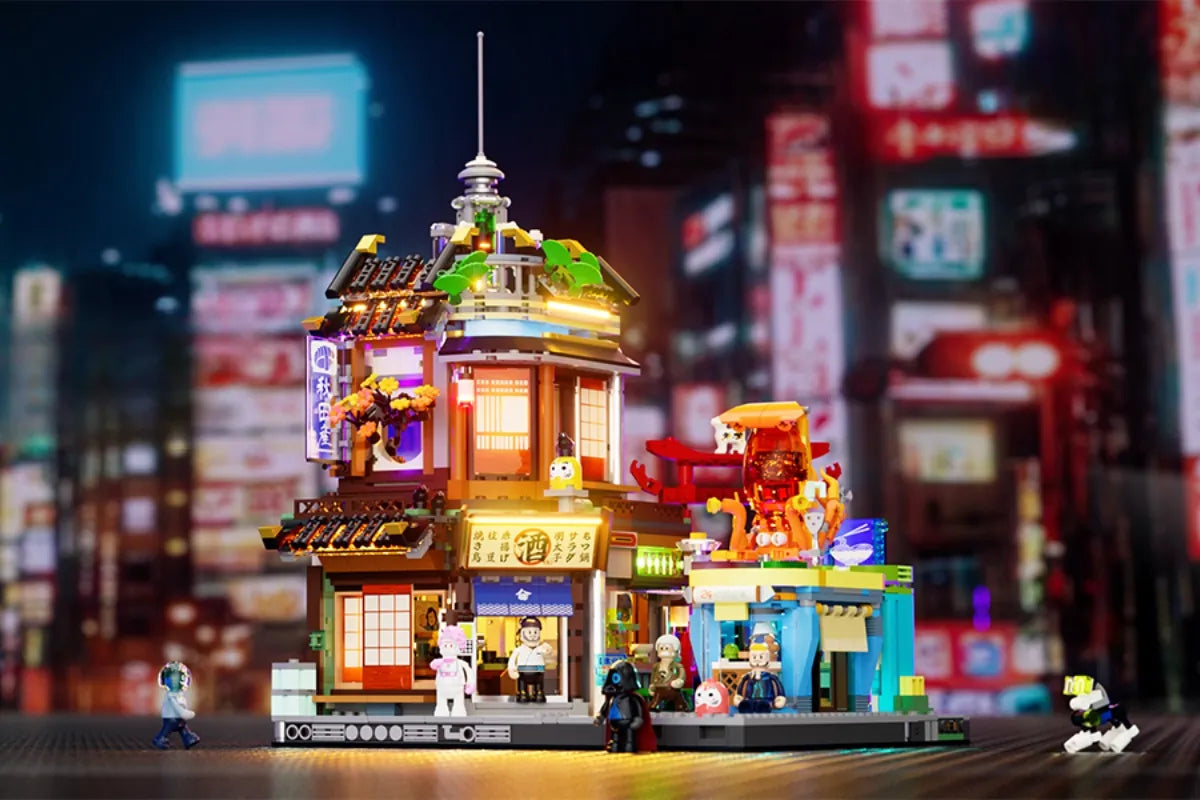 Klemmbaustein-Set Cyberpunk & Steampunk: Japanischer Street-Food-Imbiss mit Neon-Schildern und futuristischen Figuren.