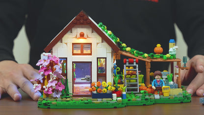 Unboxing und Detailansicht des Funwhole Home Greenhouse Gewächshaus F9059 Klemmbausteine-Sets mit Beleuchtung.